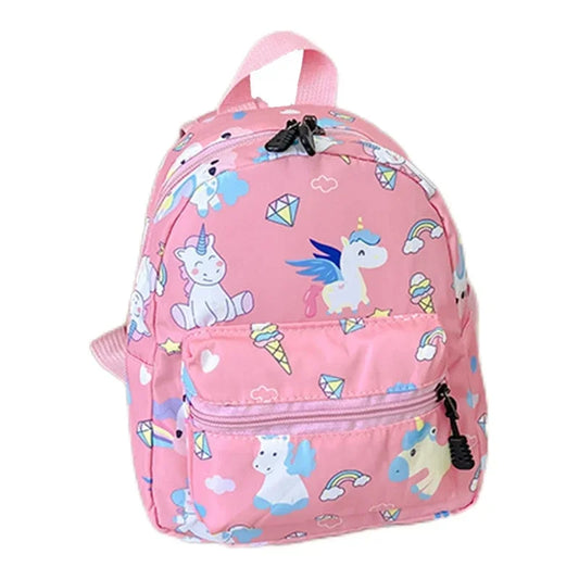 Sac a dos enfant motifs licornes rose, sur un fond blanc.